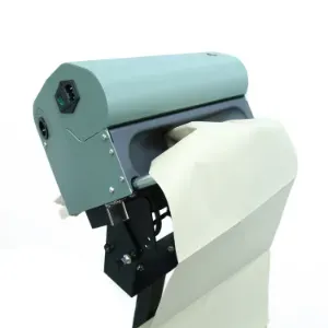 industrial-paper-dispenser-machine-with-a-roll-of-cream-colored-kraft-paper-feeding-through-the-mechanism-designed-for-pac